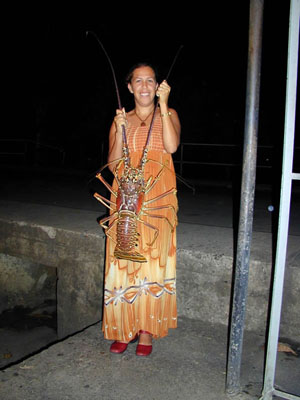 Waitress at El Batey with huge lobster