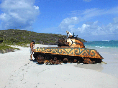 Tito and Lance examine a tank, Culebra, Puerto Rico.