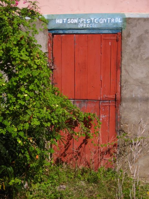 Sign on a building in Ashton, Union Island, SVG