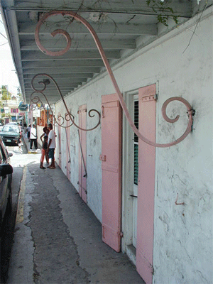 Kiss in front of lovely old Marigot Building