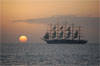 French cruise ship leaving the pitons at sunset